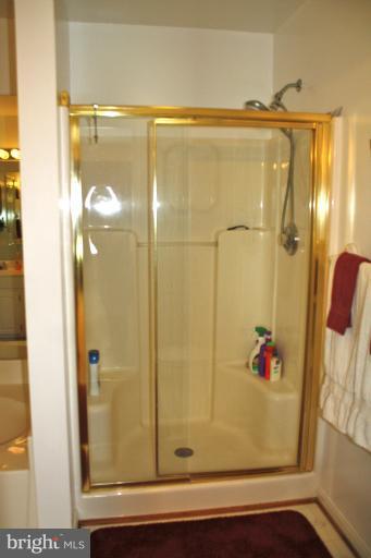 1950 Lowery Road Huntingtown, MD 20639 - Photo 8 of 28 a bathroom with a shower and a sink