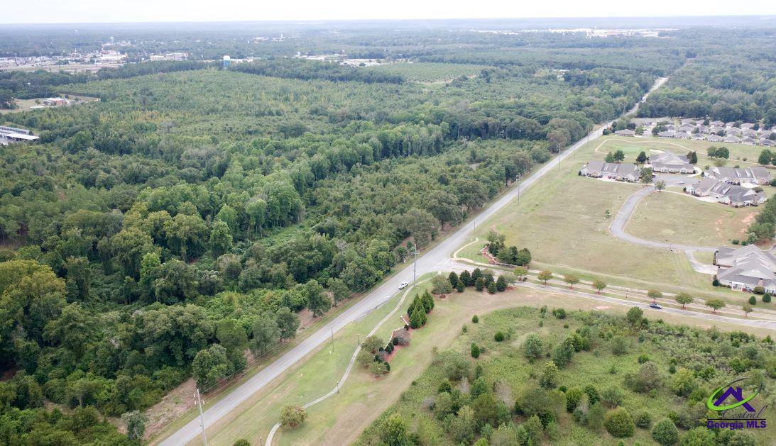 Airport Road Perry, GA 31069 - Photo 9 of 23 a view of a field with a forest