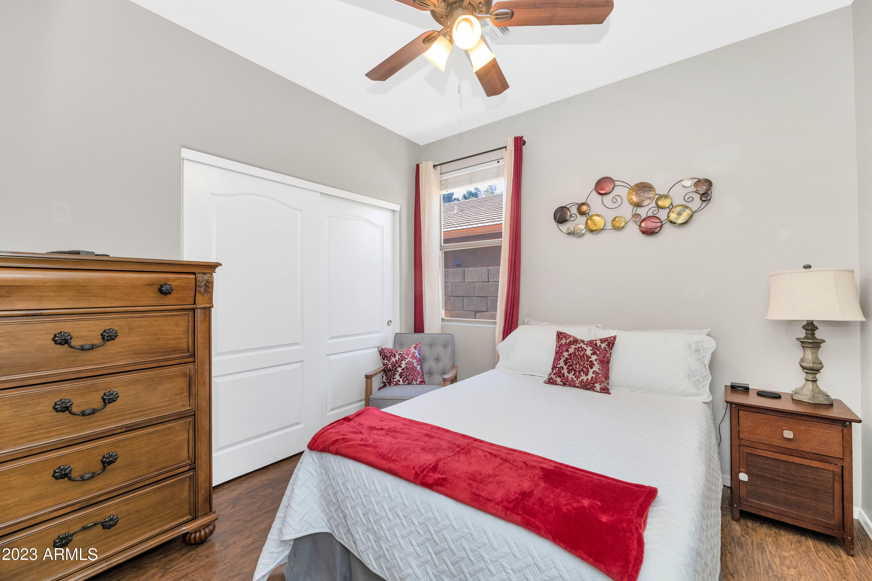 303 North Kimberlee Way Chandler, AZ 85225 - Photo 11 of 31 a bedroom with a bed and a dresser in it