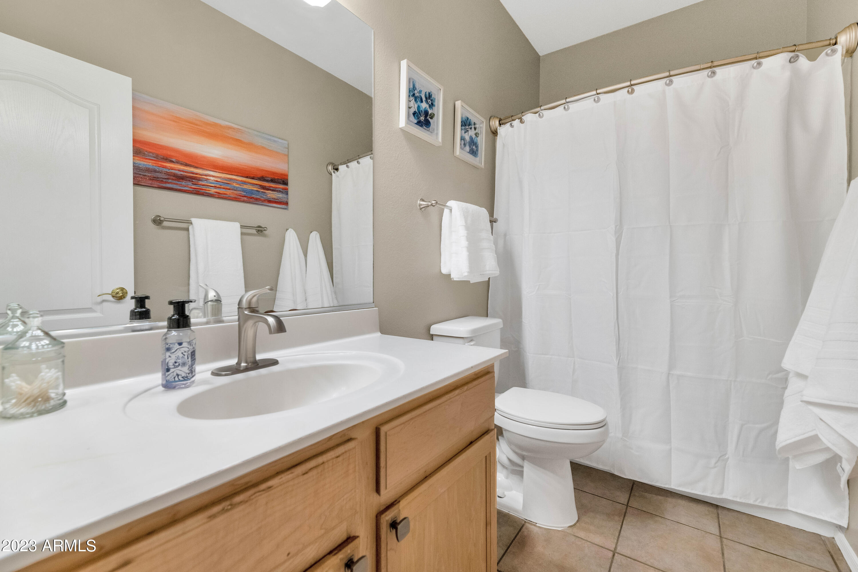 303 North Kimberlee Way Chandler, AZ 85225 - Photo 15 of 31 a bathroom with a sink and a mirror