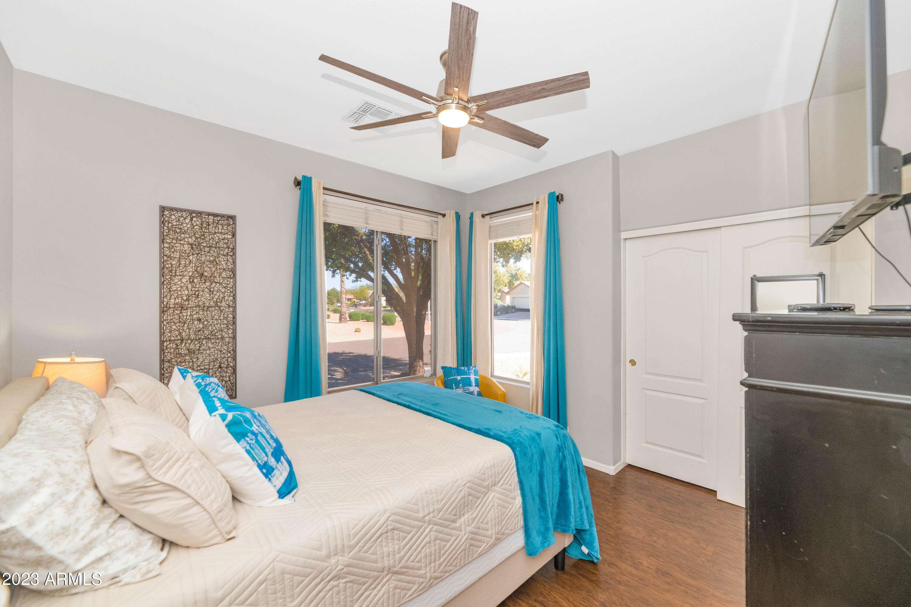 303 North Kimberlee Way Chandler, AZ 85225 - Photo 17 of 31 a bedroom with a bed and a window