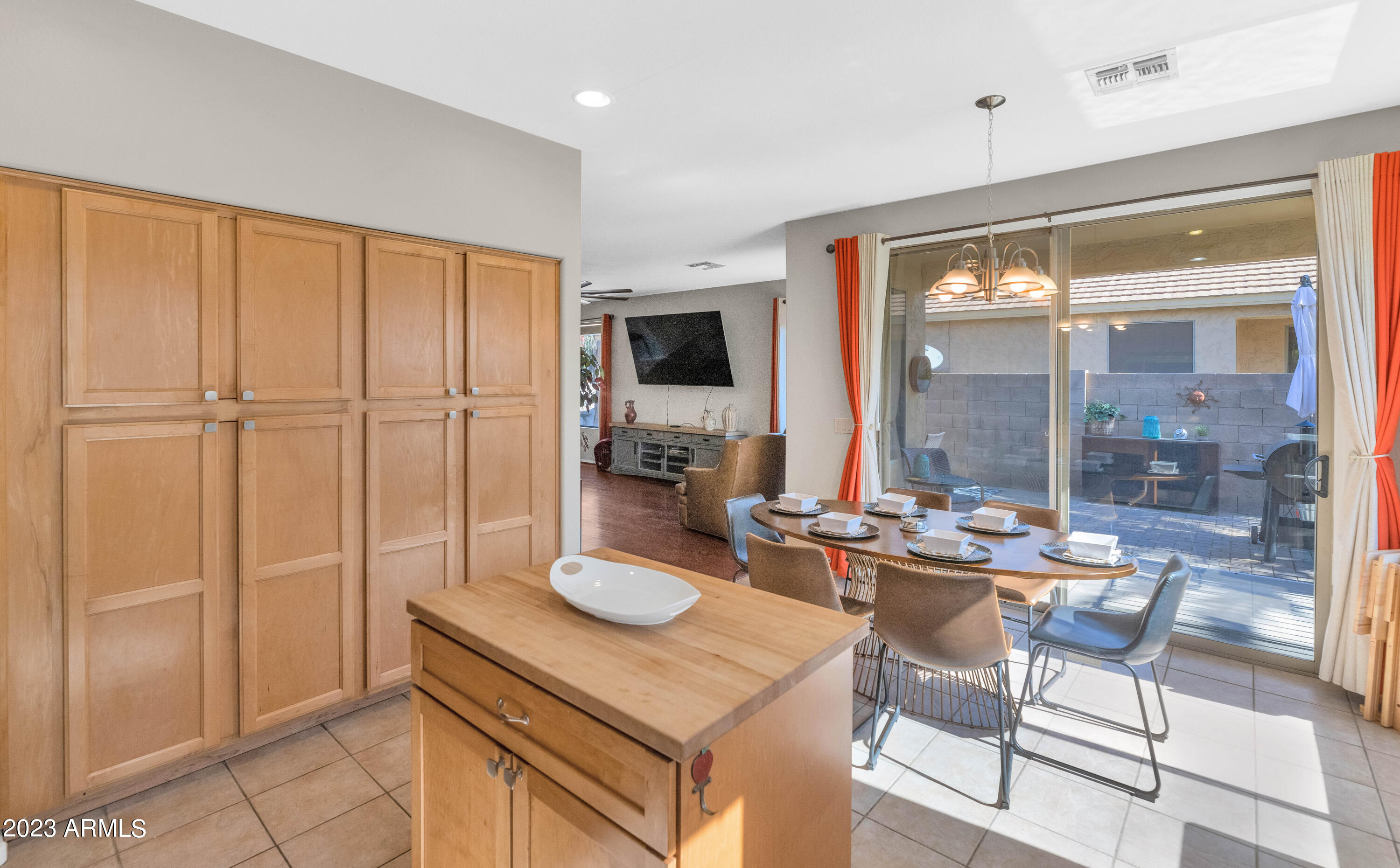 303 North Kimberlee Way Chandler, AZ 85225 - Photo 29 of 31 a view of a kitchen with a table and chairs