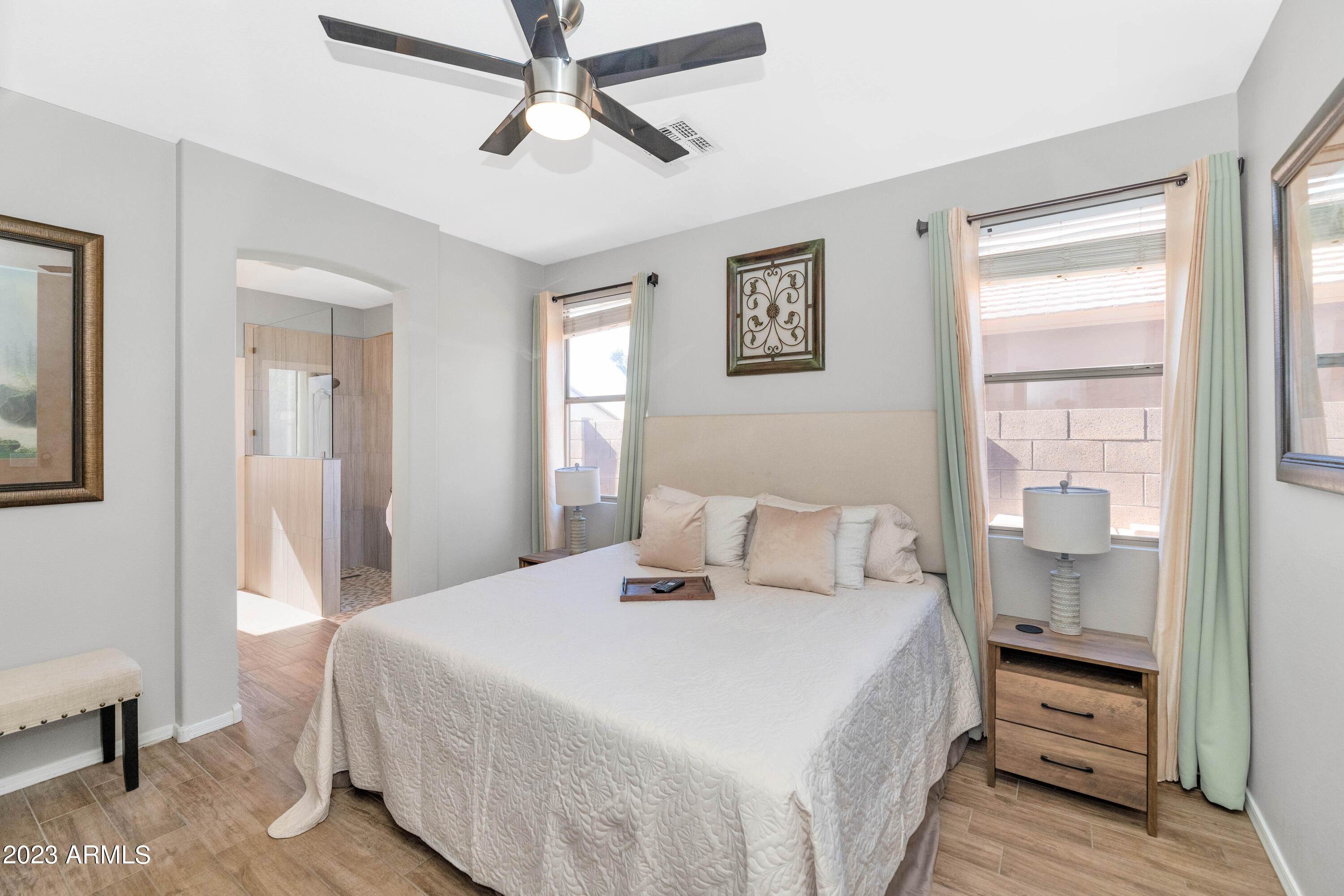 303 North Kimberlee Way Chandler, AZ 85225 - Photo 6 of 31 a bedroom with a bed and a window