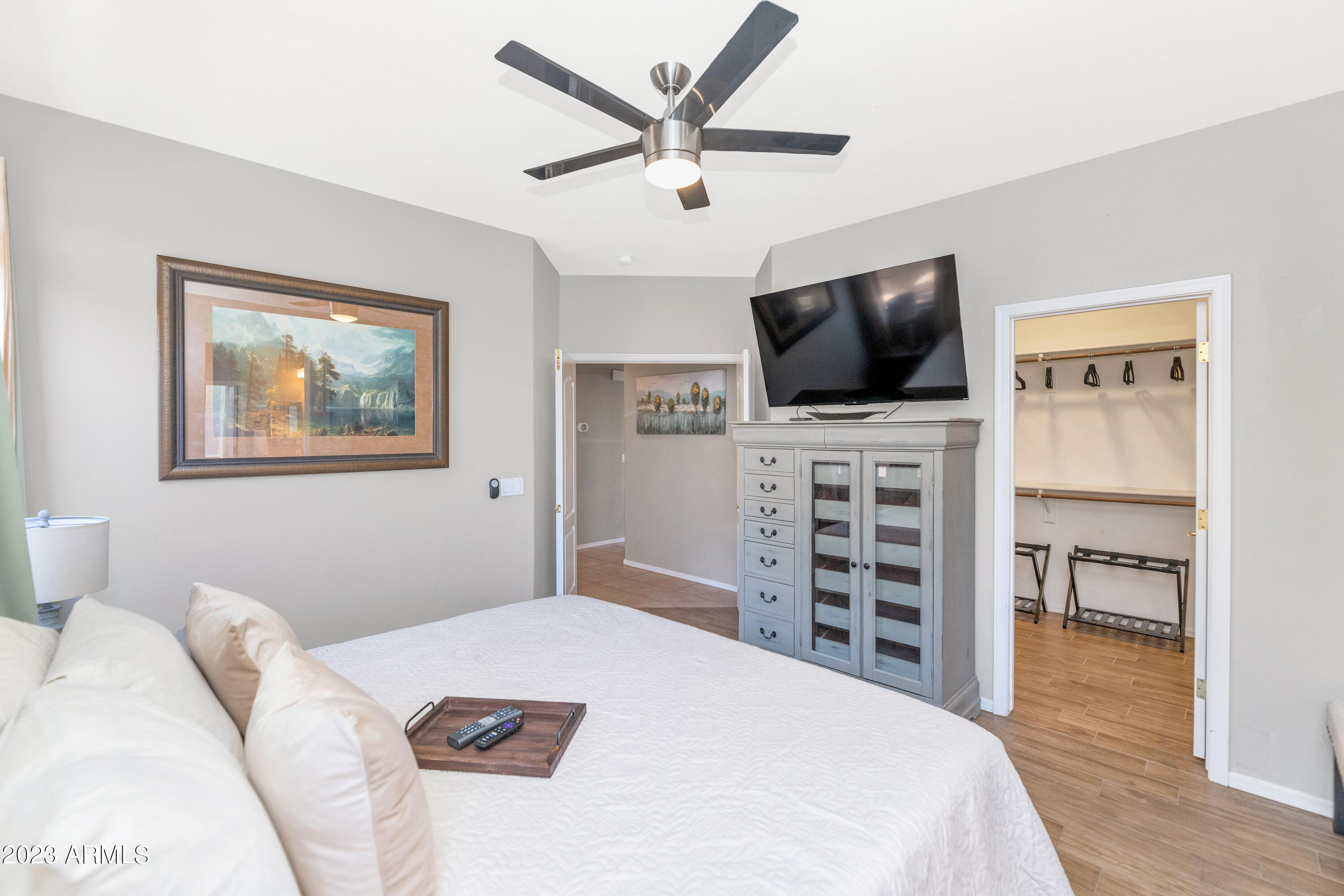 303 North Kimberlee Way Chandler, AZ 85225 - Photo 7 of 31 a bedroom with a bed and a flat screen tv