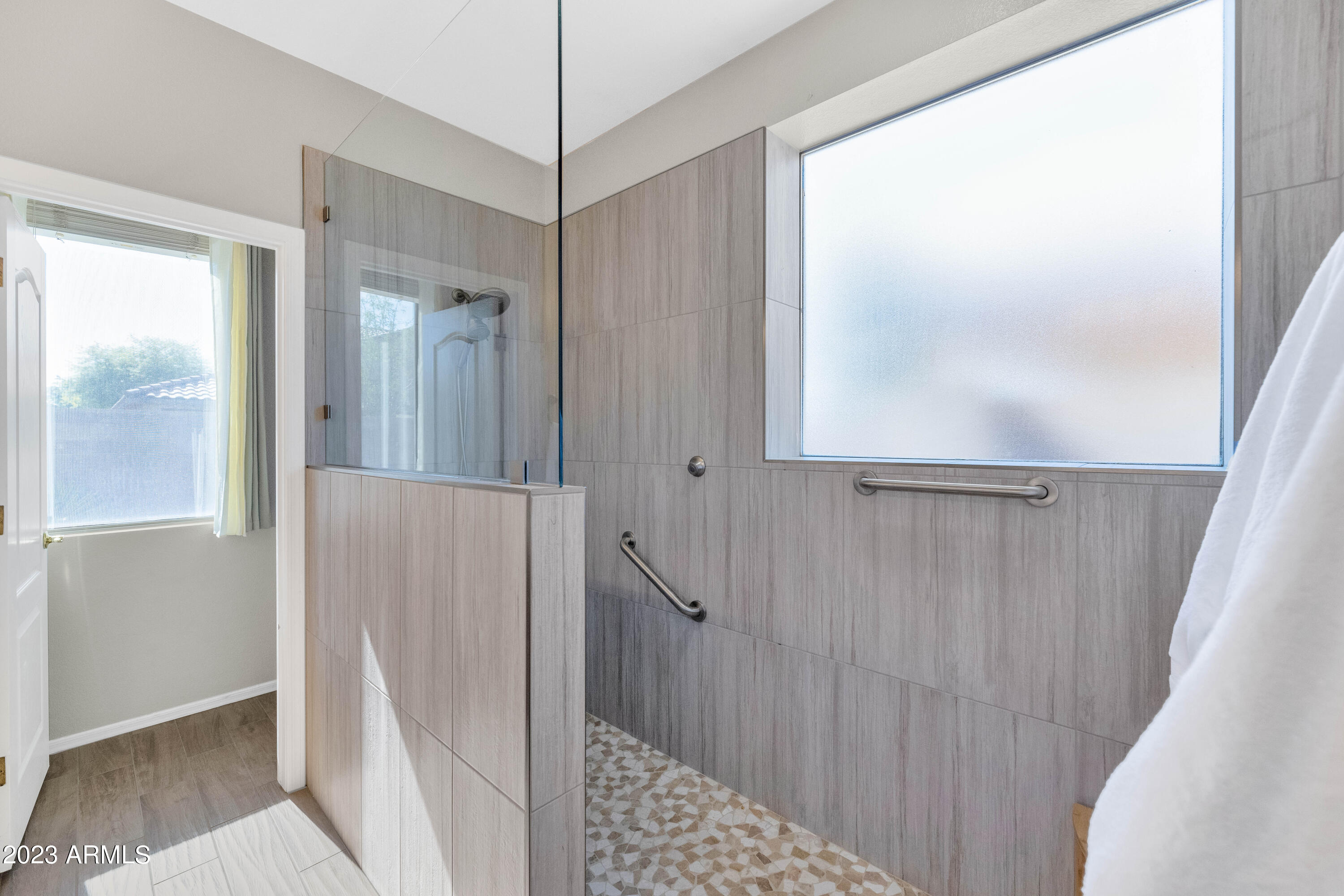 303 North Kimberlee Way Chandler, AZ 85225 - Photo 9 of 31 a bathroom with a shower and a sink