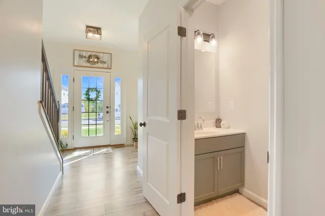 a bedroom with a bed and a television