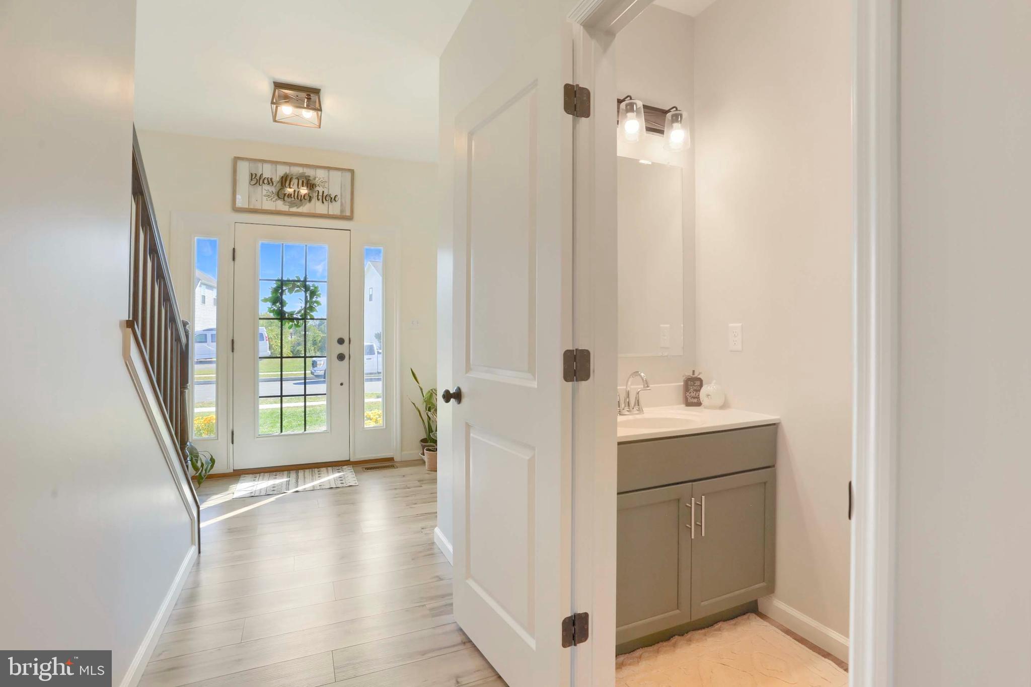 509 Elm Street Harrisburg, PA 17112 - Photo 19 of 41 a view of an entryway with wooden floor