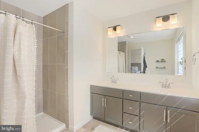 a bedroom with bed and a window