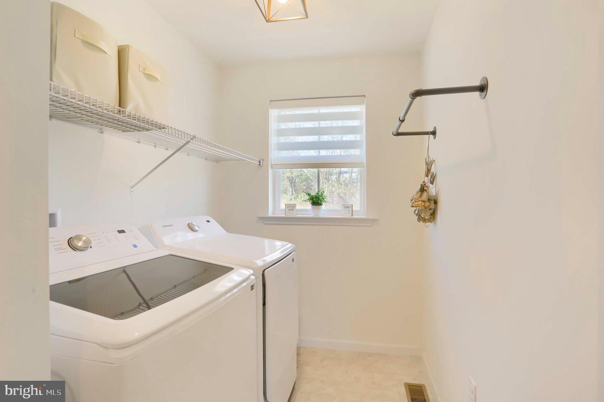 509 Elm Street Harrisburg, PA 17112 - Photo 29 of 41 a utility room with dryer and washer