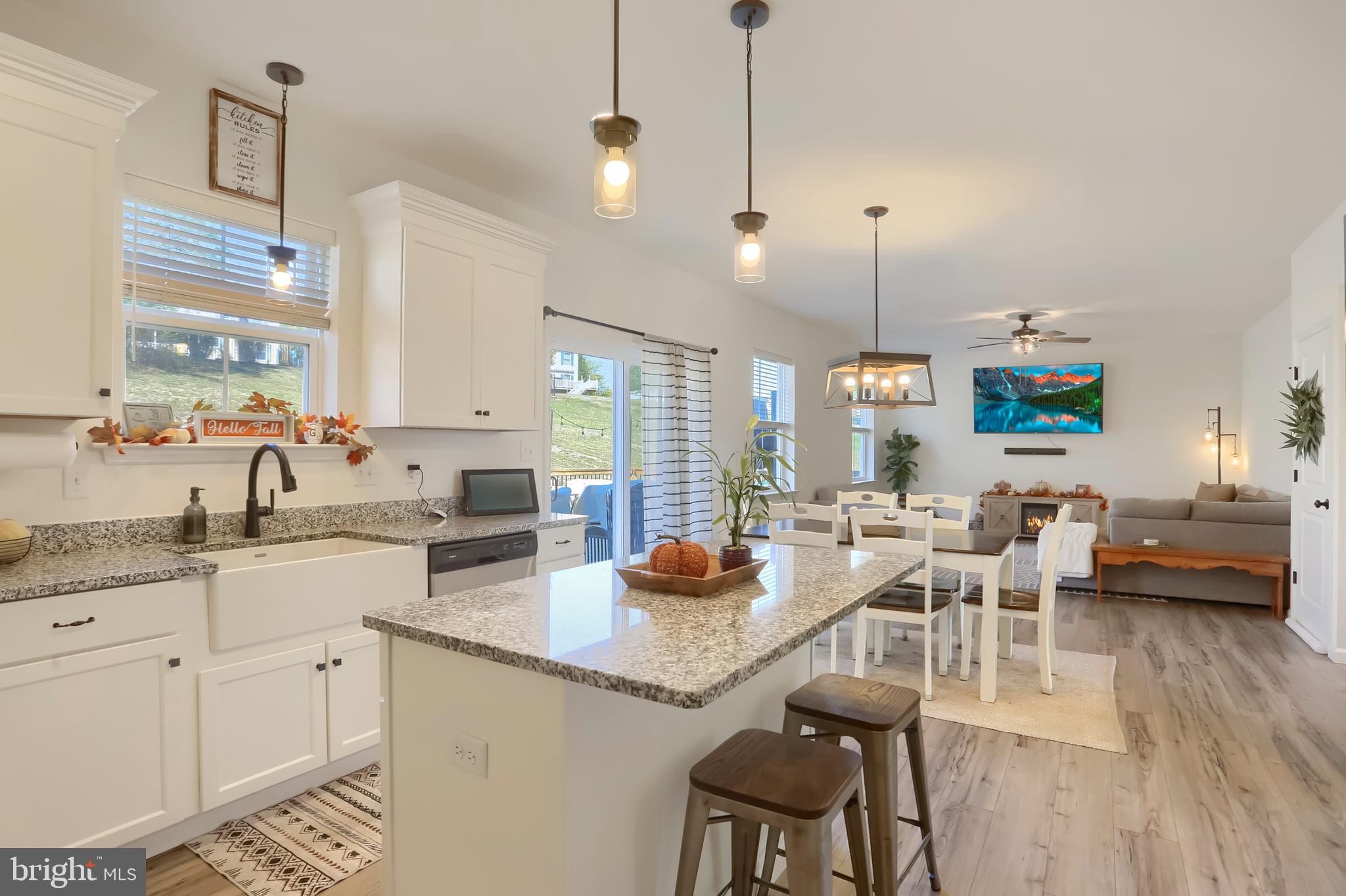 509 Elm Street Harrisburg, PA 17112 - Photo 10 of 41 a kitchen with white cabinets and sink