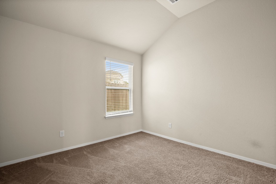 5601 Respinto Drive Austin, TX 78747 - Photo 12 of 17 an empty room with a window