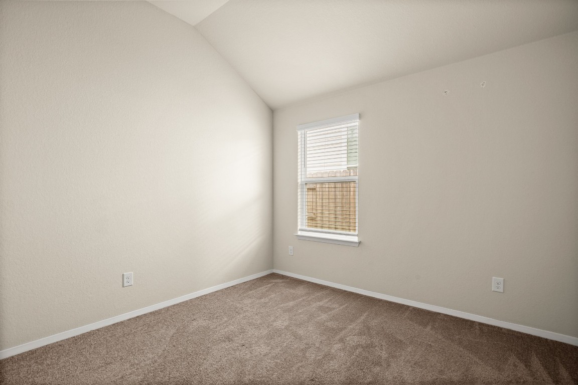 5601 Respinto Drive Austin, TX 78747 - Photo 13 of 17 an empty room with a window