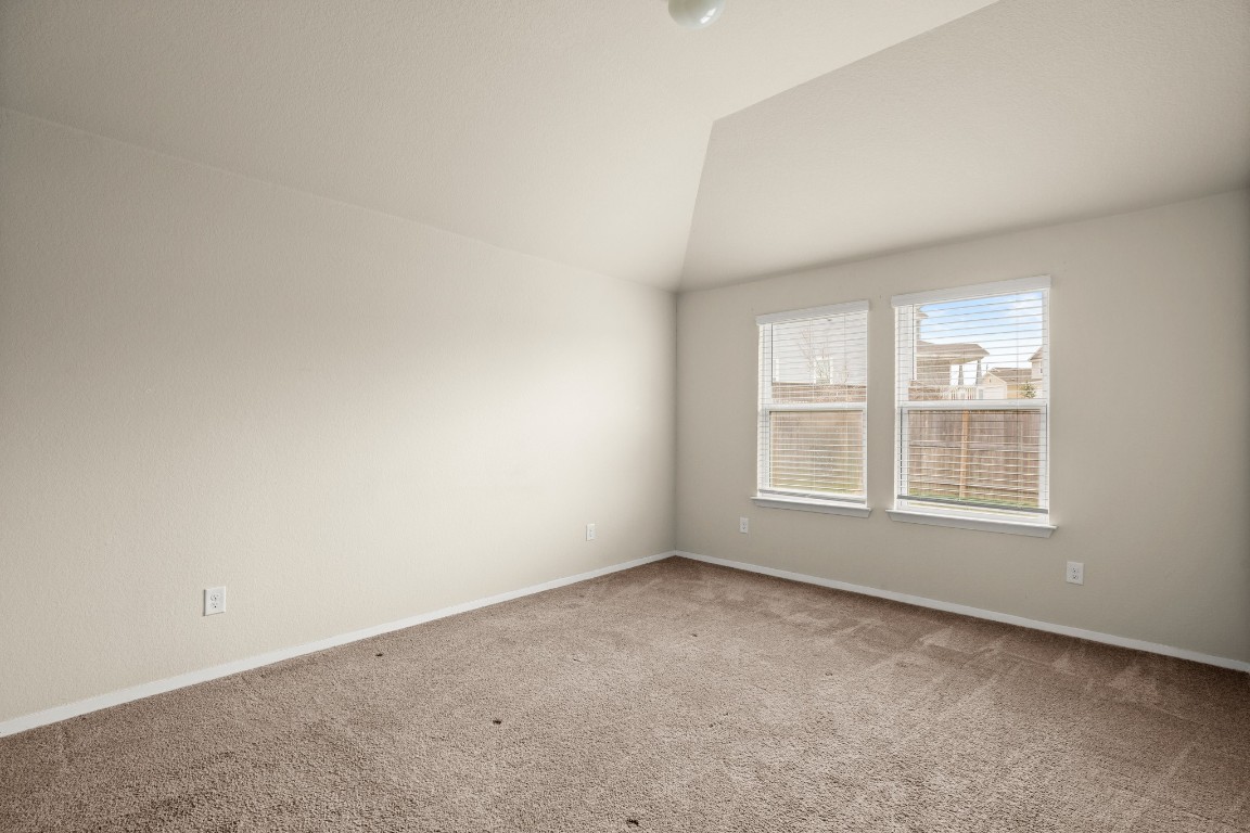 5601 Respinto Drive Austin, TX 78747 - Photo 9 of 17 an empty room with a window