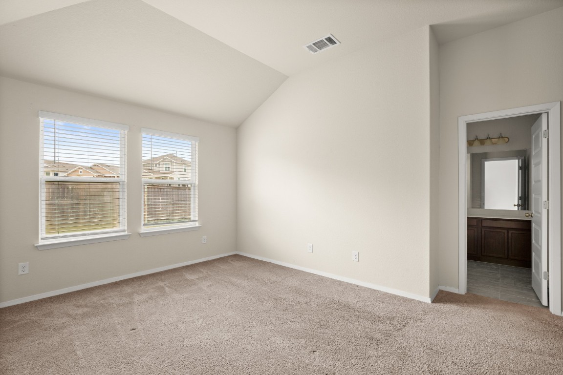 5601 Respinto Drive Austin, TX 78747 - Photo 10 of 17 a view of an empty room with a window