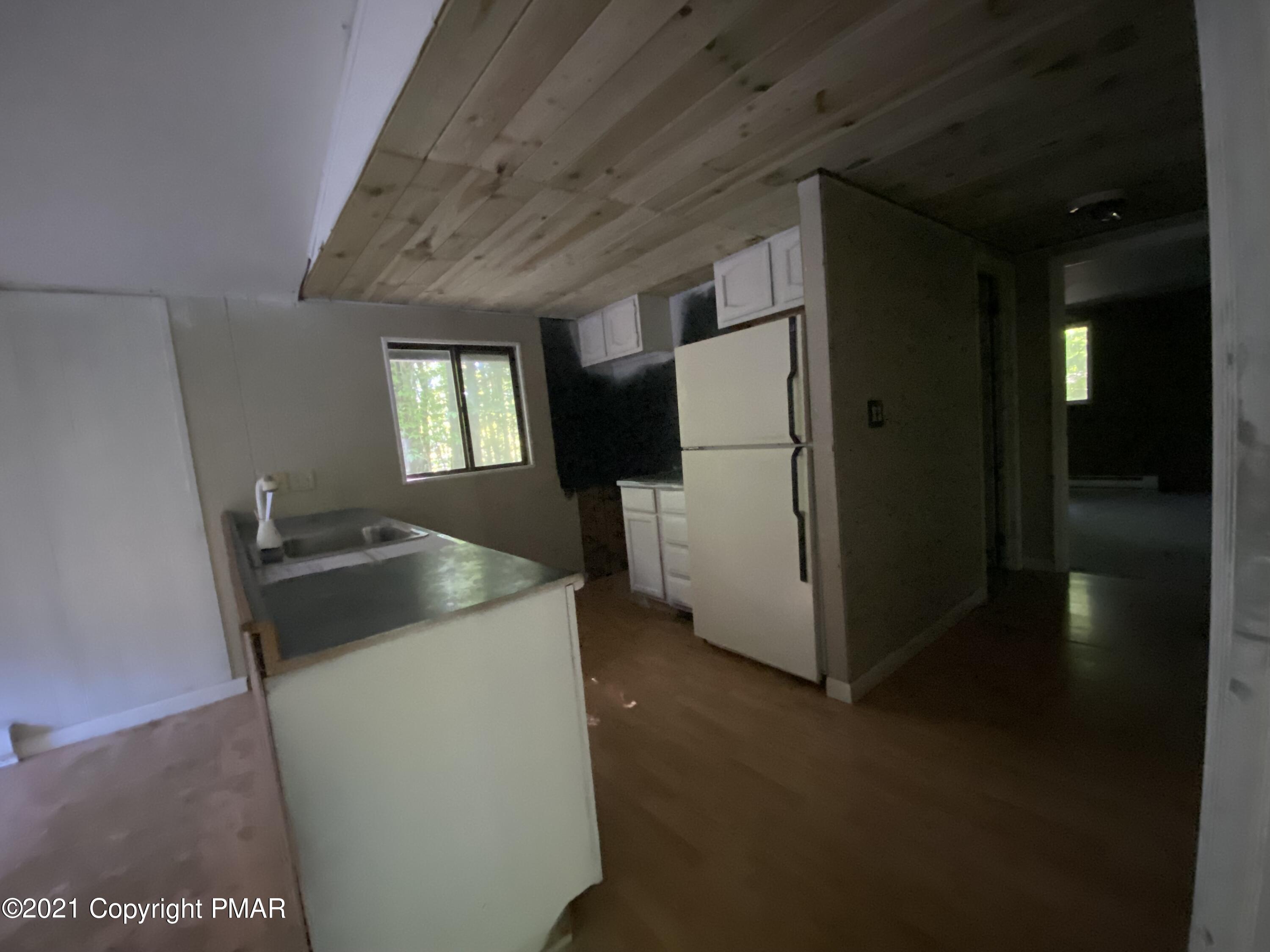1194 Deer Run Pocono Pines, PA 18350 - Photo 11 of 14 a utility room with dryer and washer