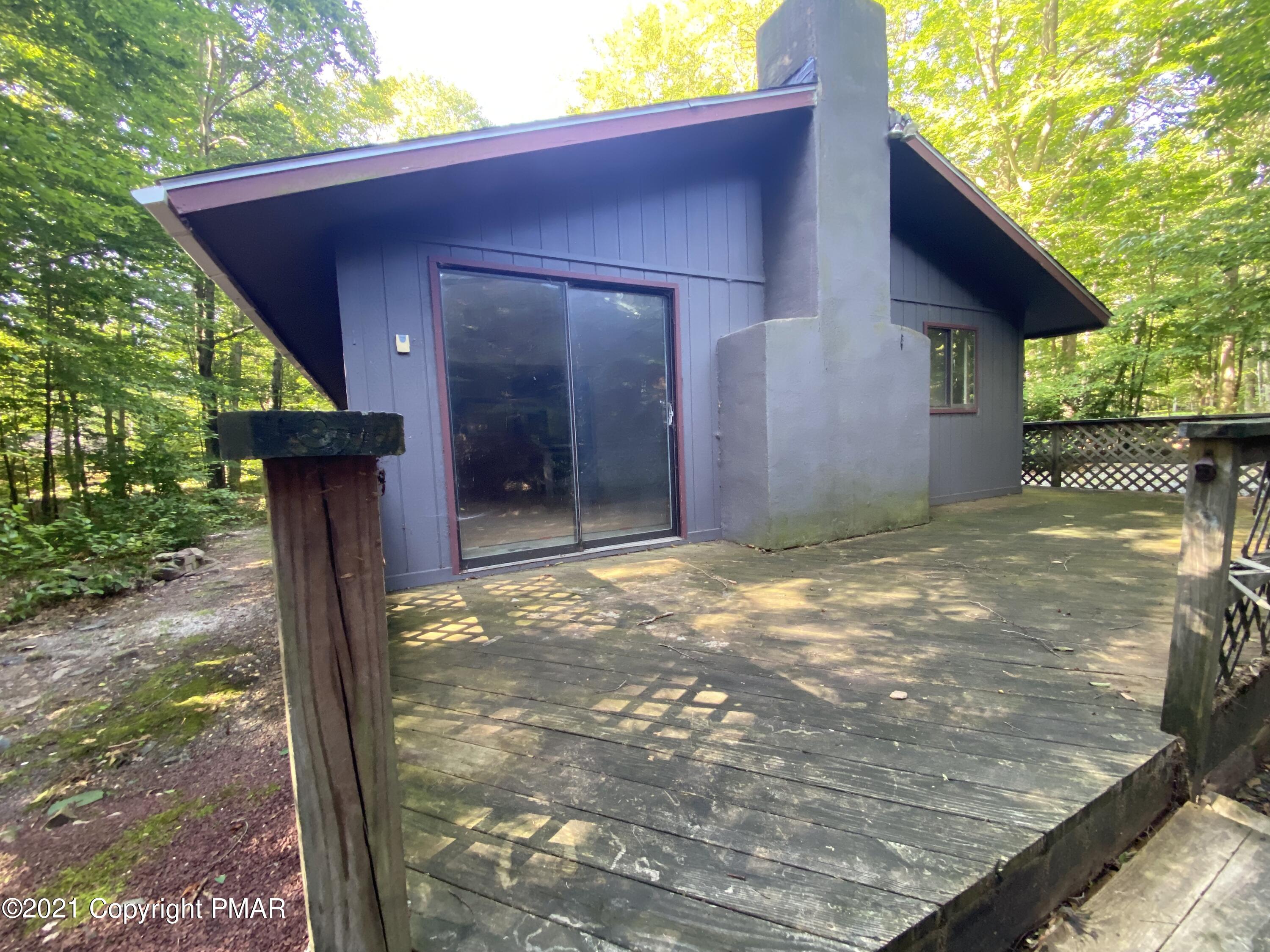 1194 Deer Run Pocono Pines, PA 18350 - Photo 3 of 14 a view of a house with a yard
