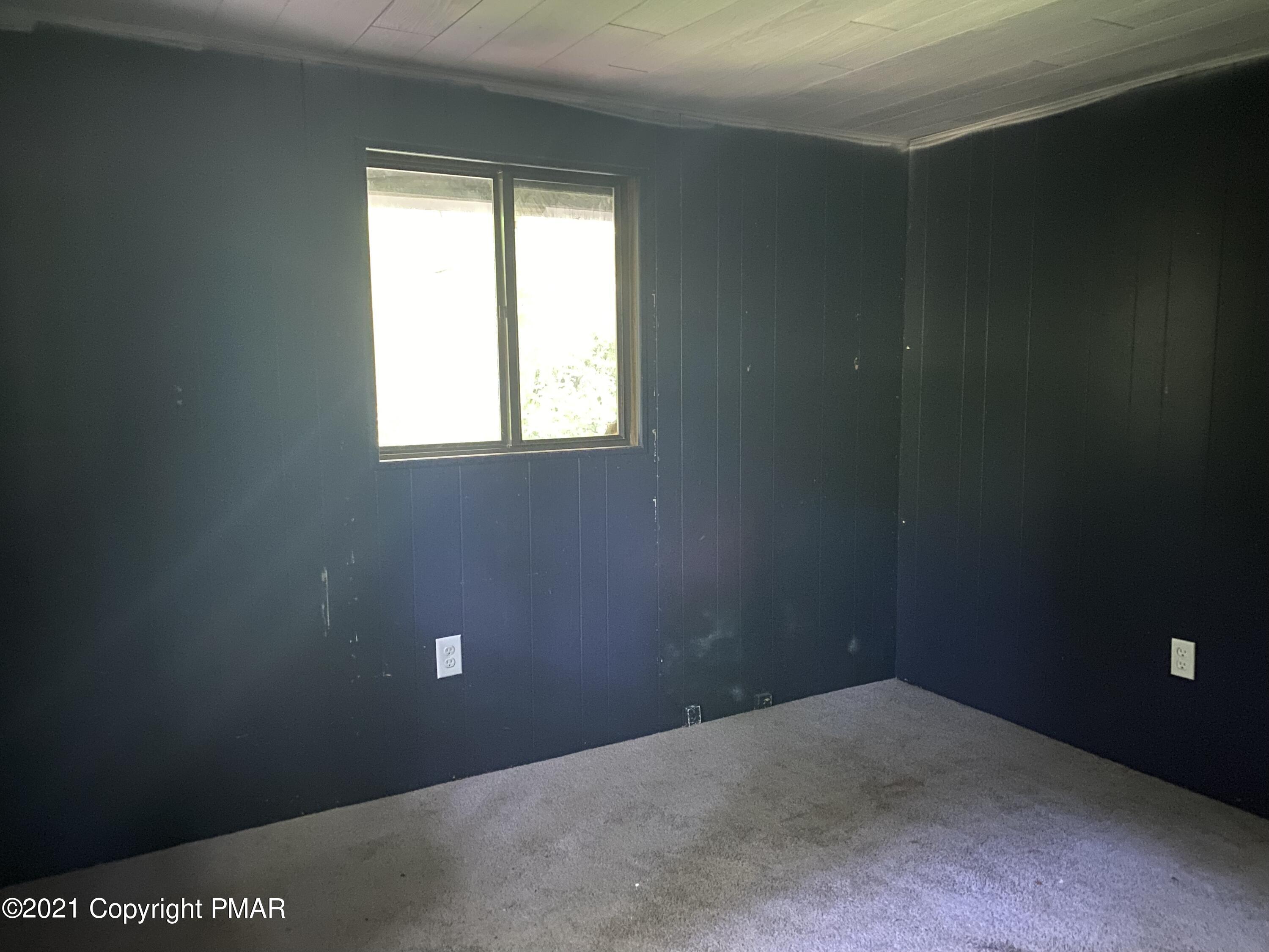 1194 Deer Run Pocono Pines, PA 18350 - Photo 6 of 14 a view of a small space with a window