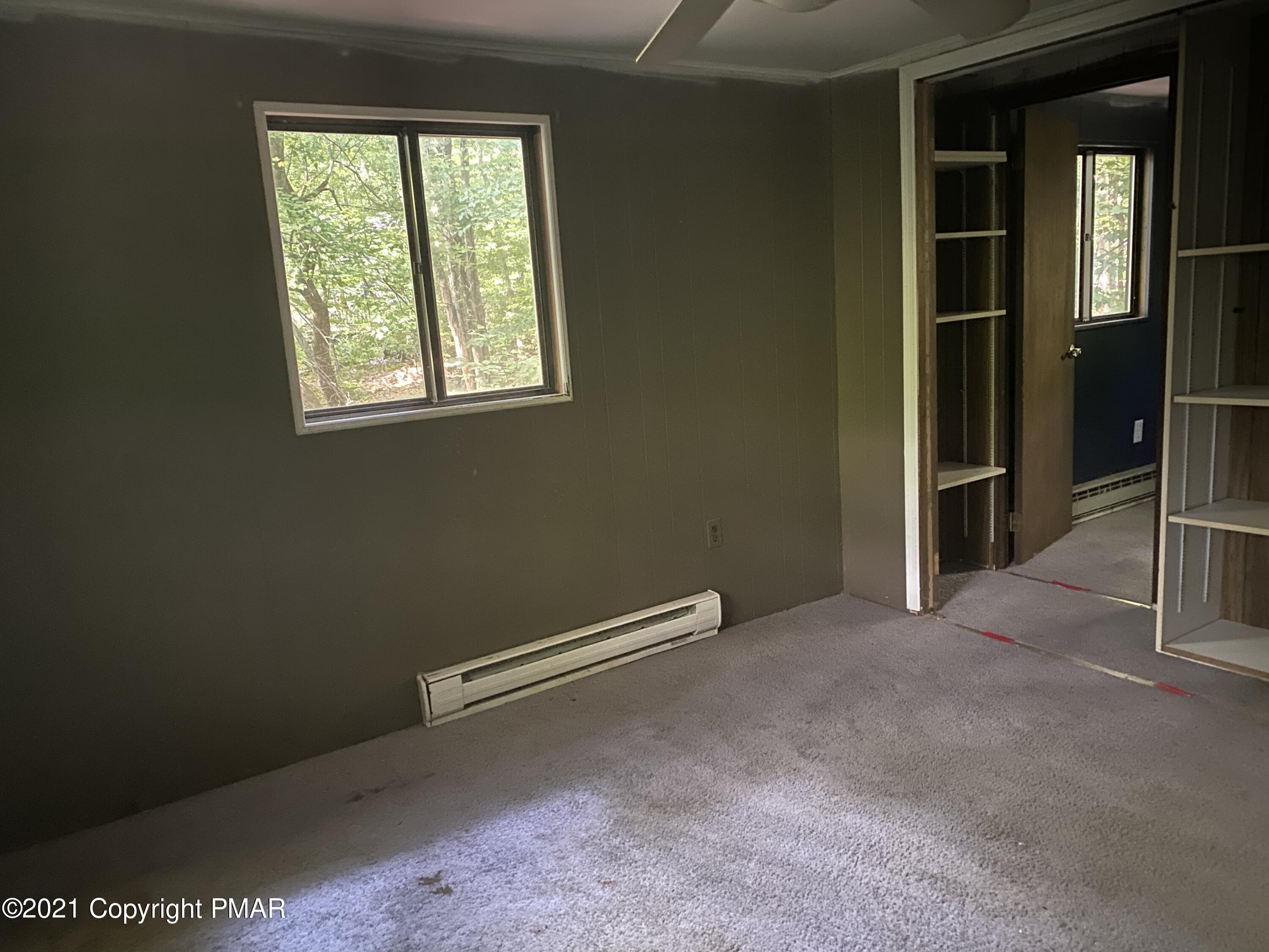 1194 Deer Run Pocono Pines, PA 18350 - Photo 7 of 14 a view of an empty room with a window