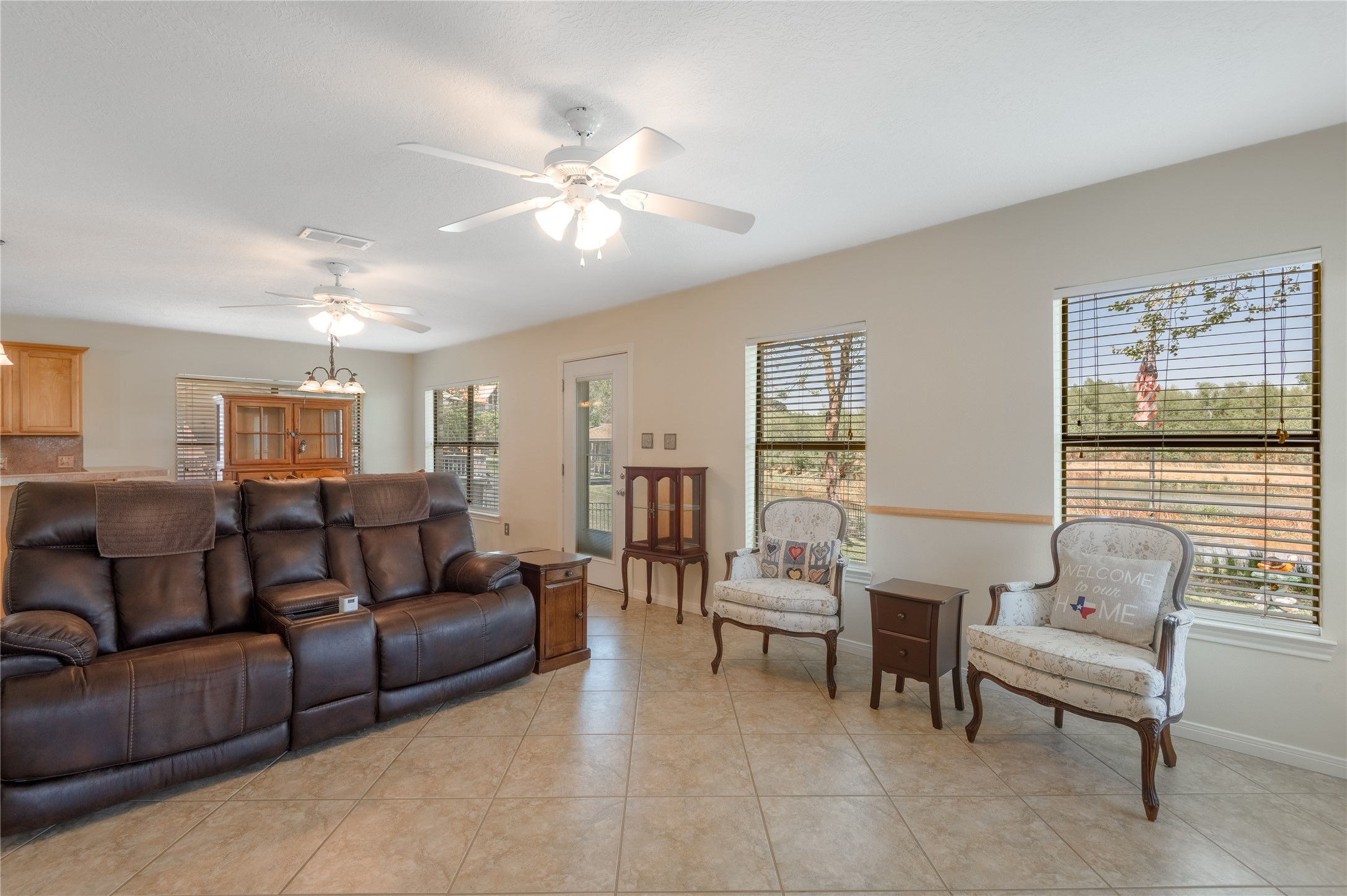 15 Lake Side Trinity, TX 75862 - Photo 13 of 33 a living room with furniture and a large window