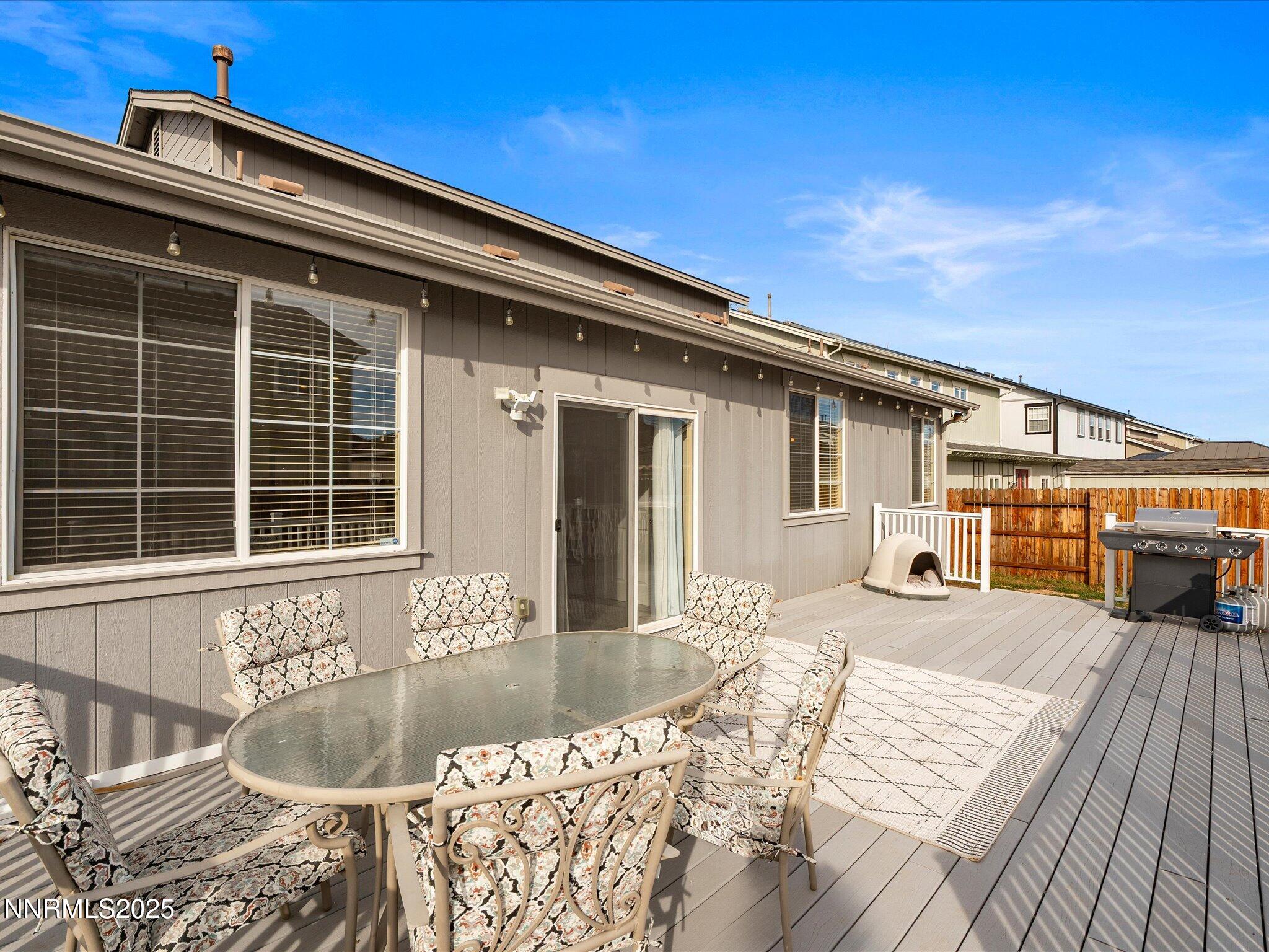 8934 Sorcha Street Reno, NV 89506 - Photo 45 of 60 a front view of a house with a large space