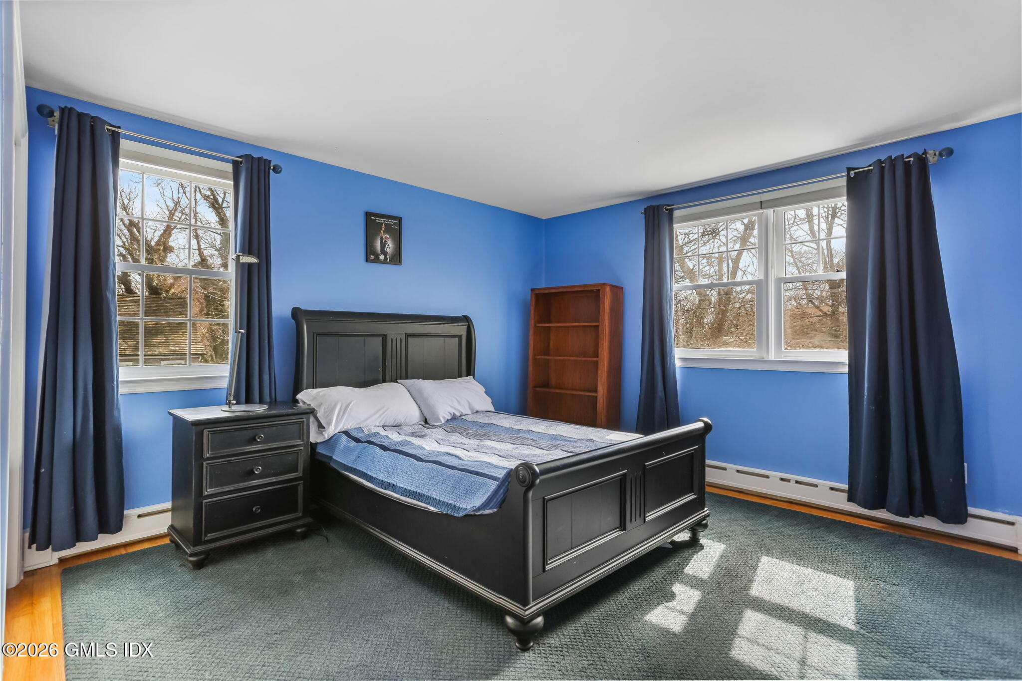 153 Lockwood Road Riverside, CT 06878 - Photo 37 of 58 a bedroom with a bed and a window