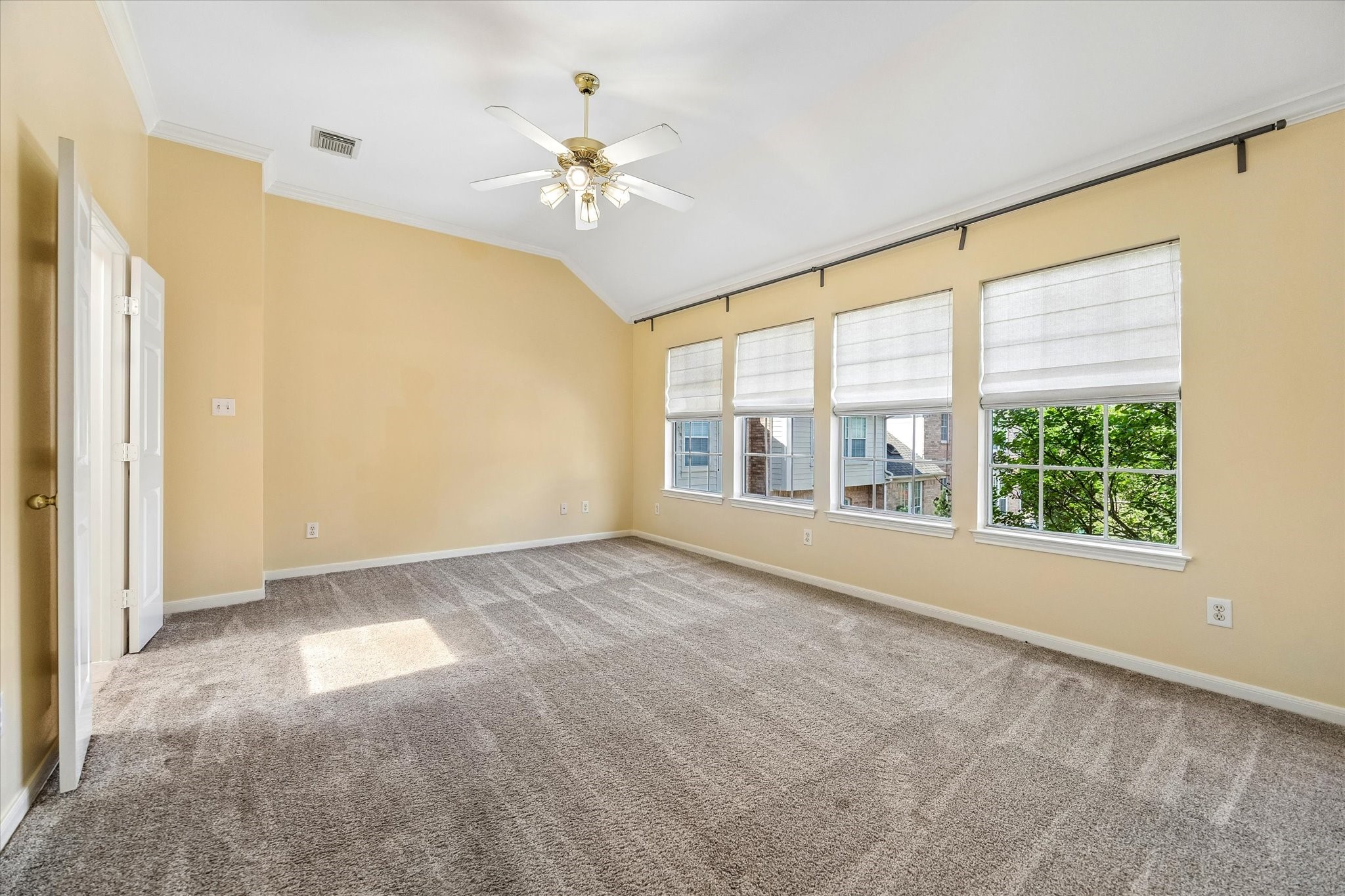 2915 Jackson Street Houston, TX 77004 - Photo 11 of 23 a view of an empty room with chandelier fan and fire place
