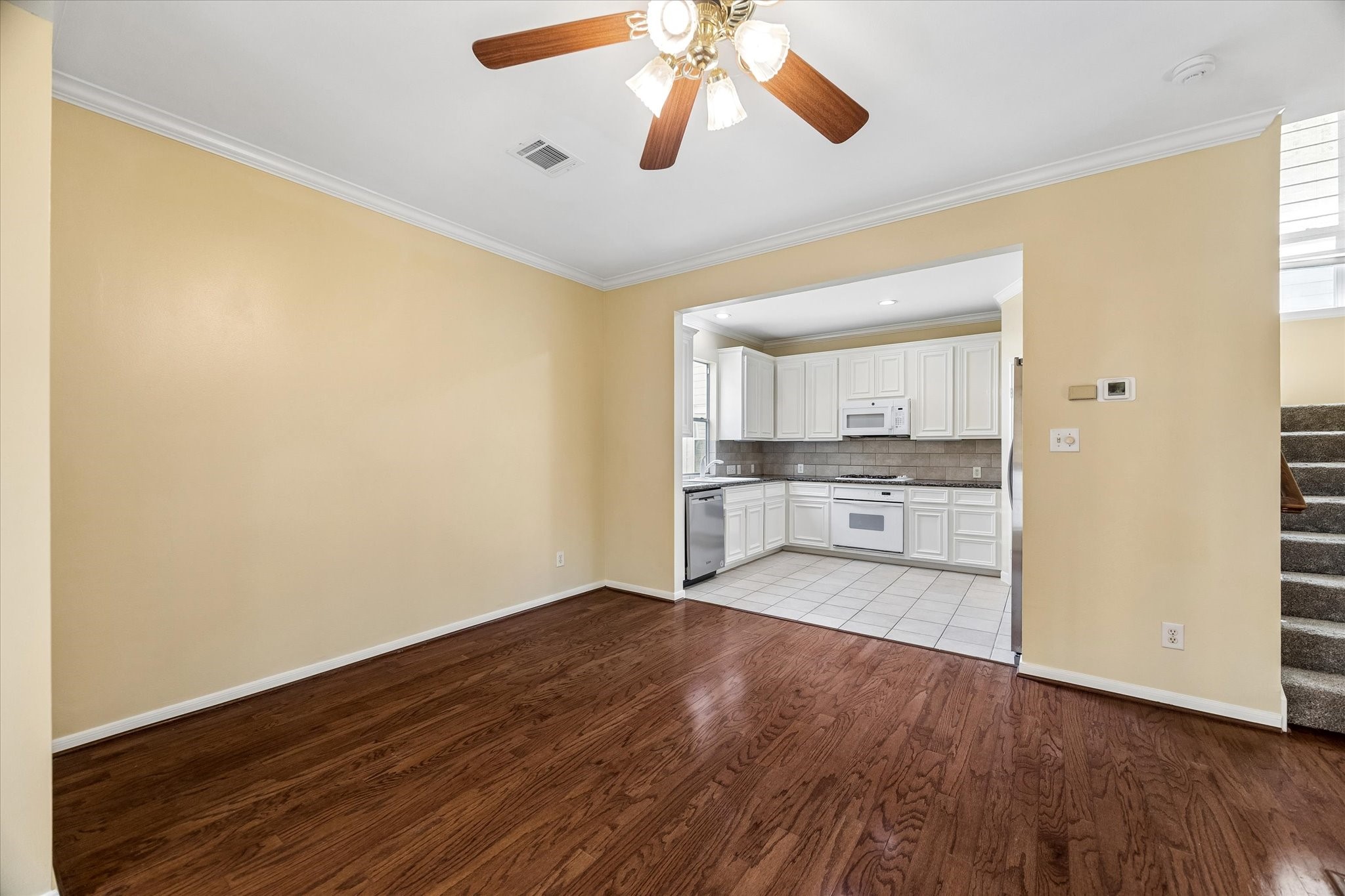 2915 Jackson Street Houston, TX 77004 - Photo 3 of 23 wooden floor in an empty room with a window