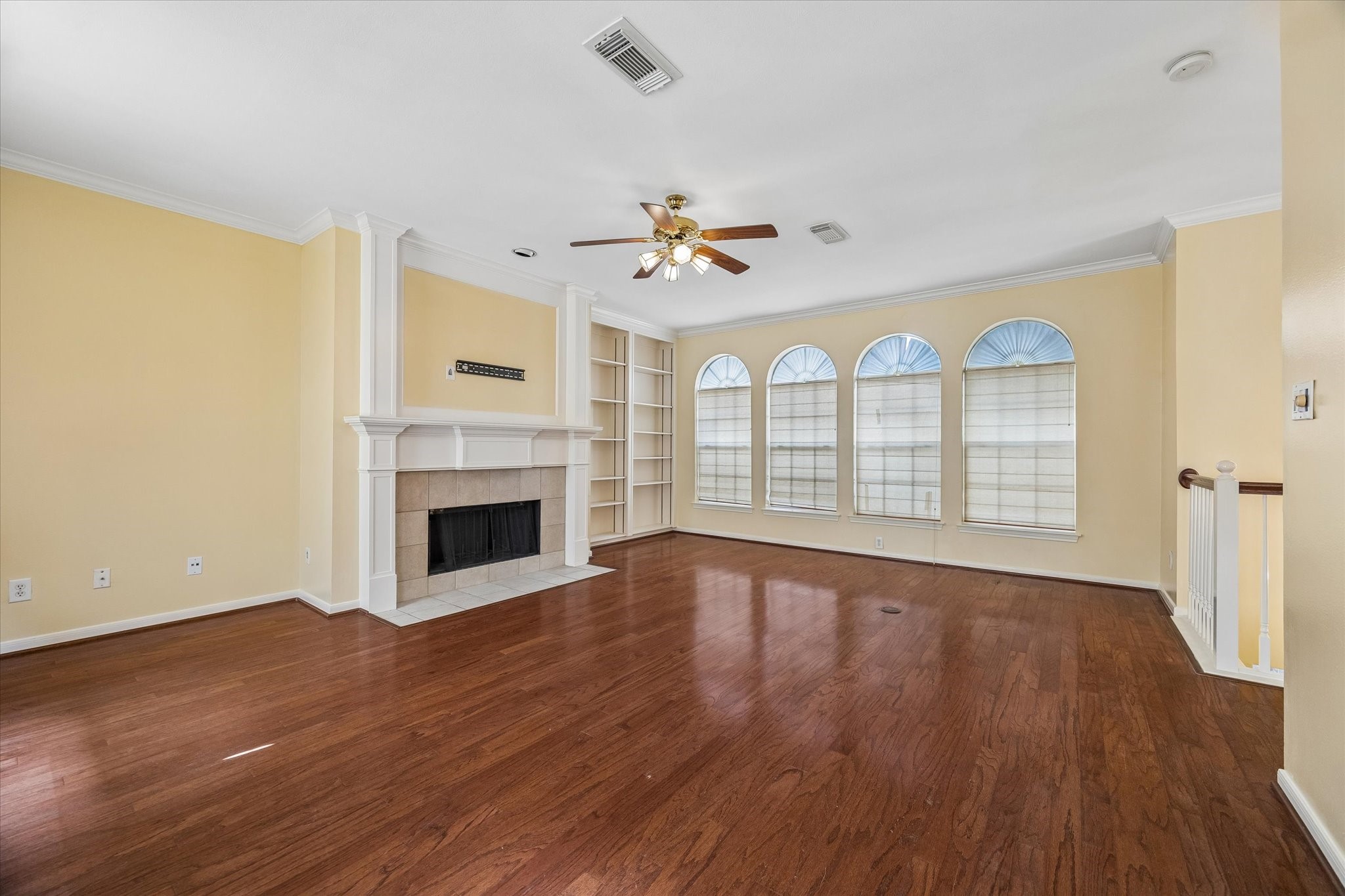 2915 Jackson Street Houston, TX 77004 - Photo 7 of 23 a view of an empty room with a window and wooden floor