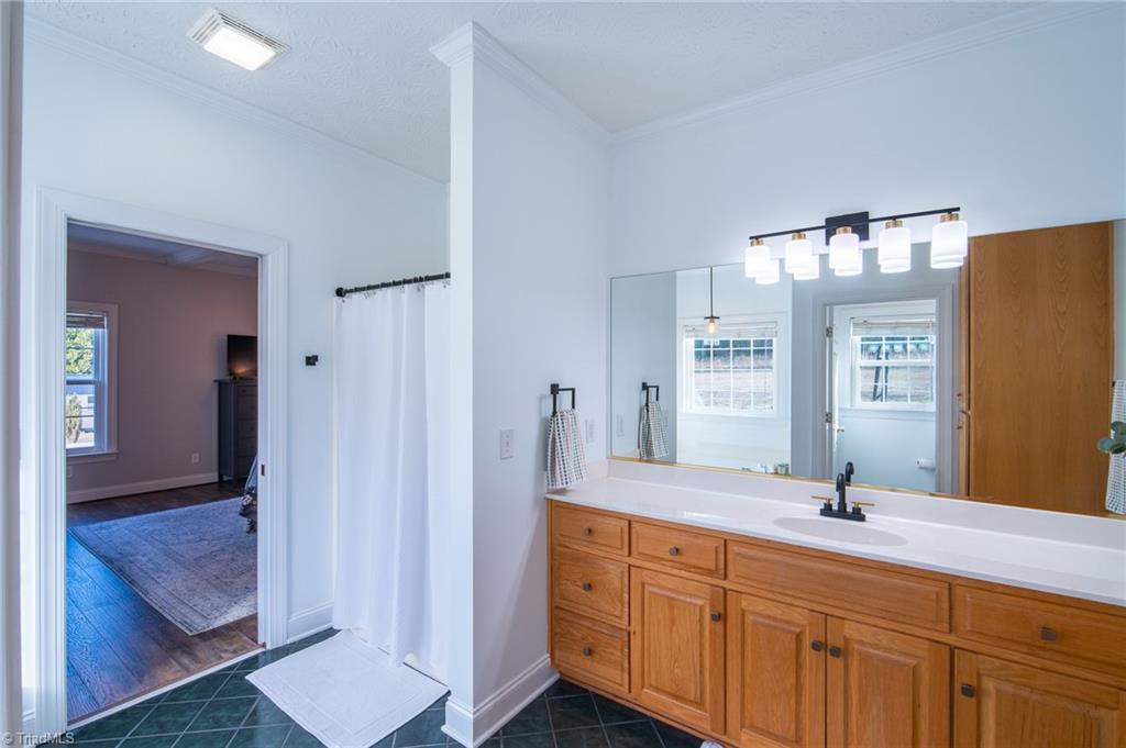 360 Sunset Road Clemmons, NC 27012 - Photo 14 of 37 separate shower and long vanity with updated lighting and faucet