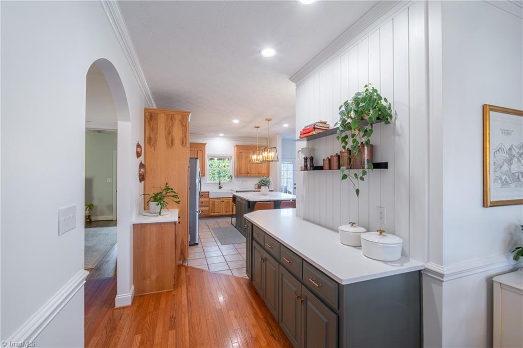 360 Sunset Road Clemmons, NC 27012 - Photo 7 of 37 extended cabinetry from kitchen to dining area