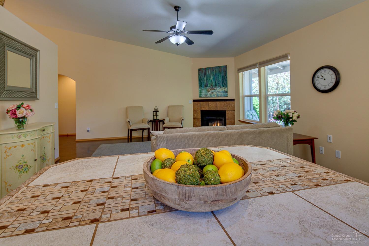 20564 Slalom Way Bend, OR 97702 - Photo 12 of 23 The tiled kitchen island has dual purpos