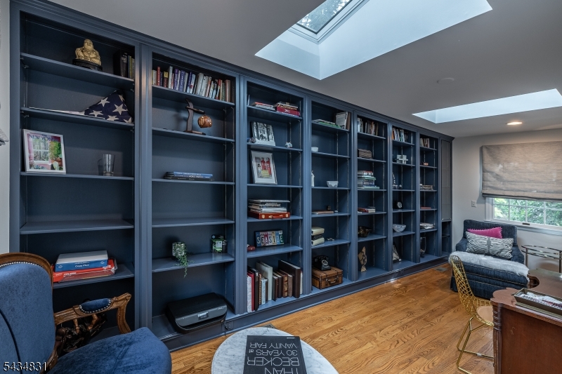 200 Wychwood Road Westfield, NJ 07090 - Photo 5 of 31 a room with furniture and a book shelf