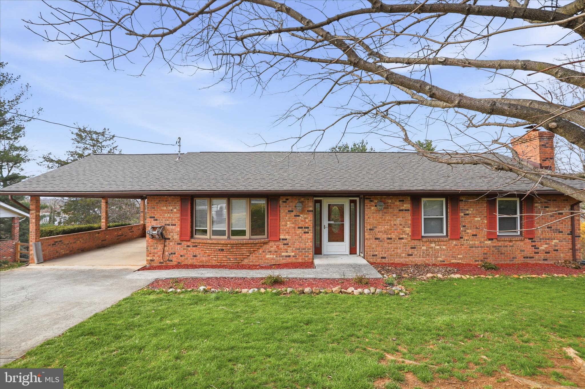 20 Gloucester Road Front Royal, VA 22630 - Photo 1 of 43 a front view of a house with a yard and a tree