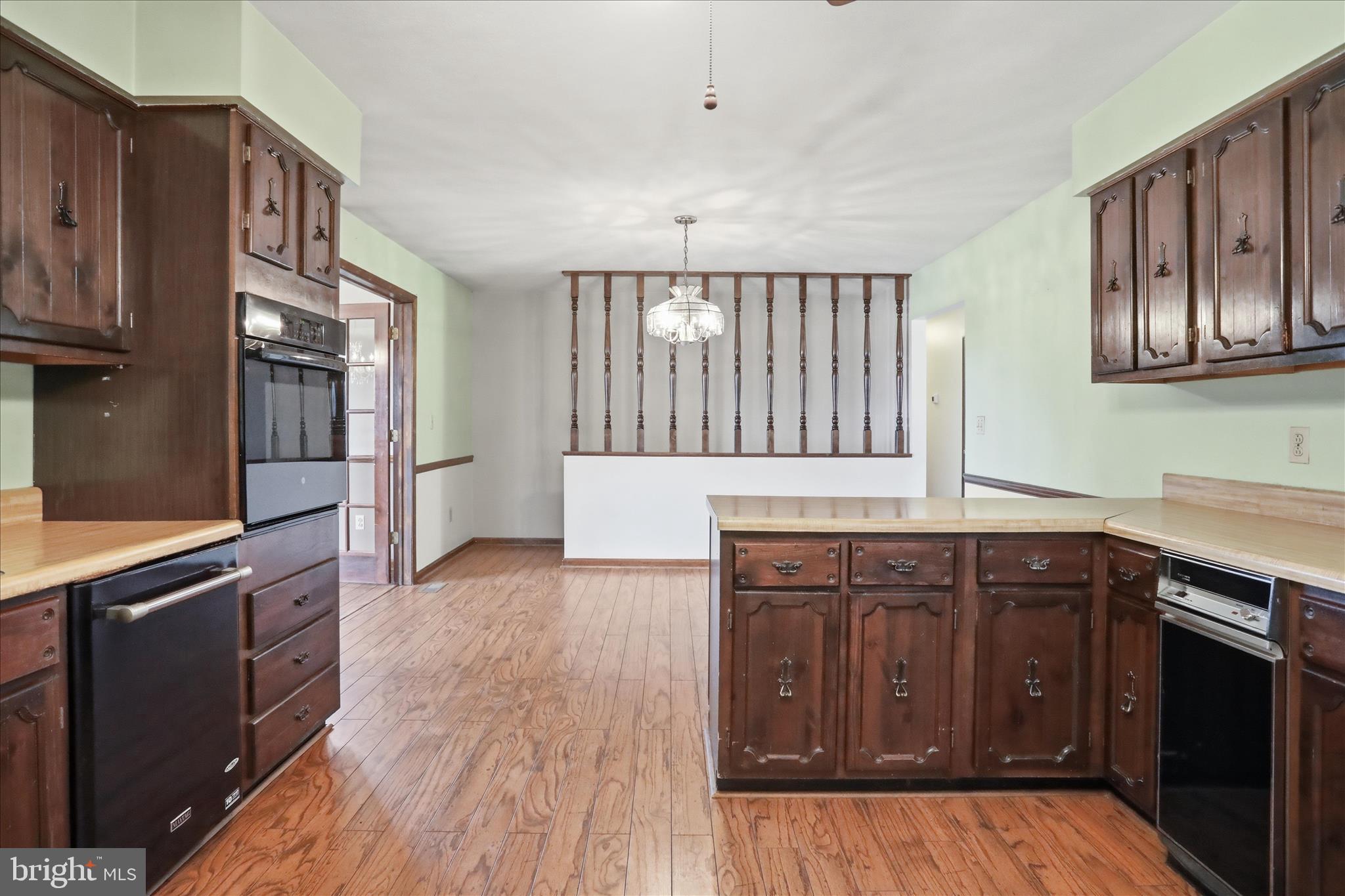 20 Gloucester Road Front Royal, VA 22630 - Photo 12 of 43 a kitchen with stainless steel appliances granite countertop a stove and a refrigerator