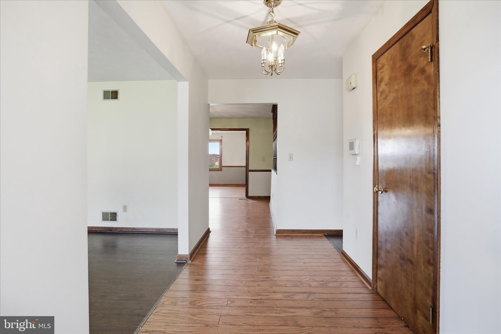 20 Gloucester Road Front Royal, VA 22630 - Photo 21 of 43 a view of a hallway with wooden floor and staircase