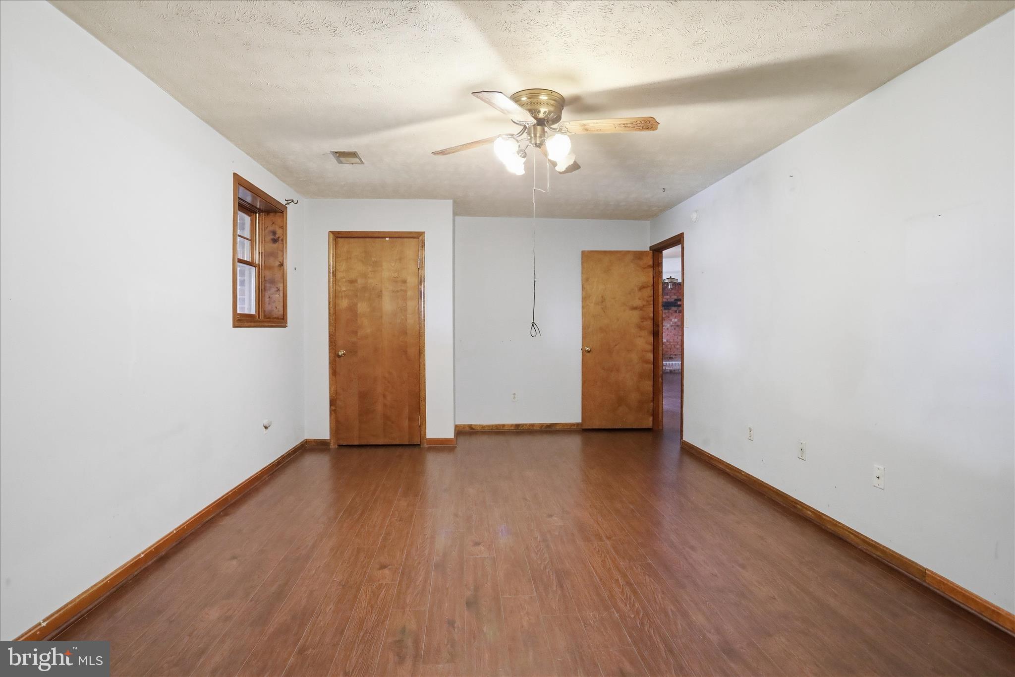 20 Gloucester Road Front Royal, VA 22630 - Photo 34 of 43 a view of an empty room with wooden floor
