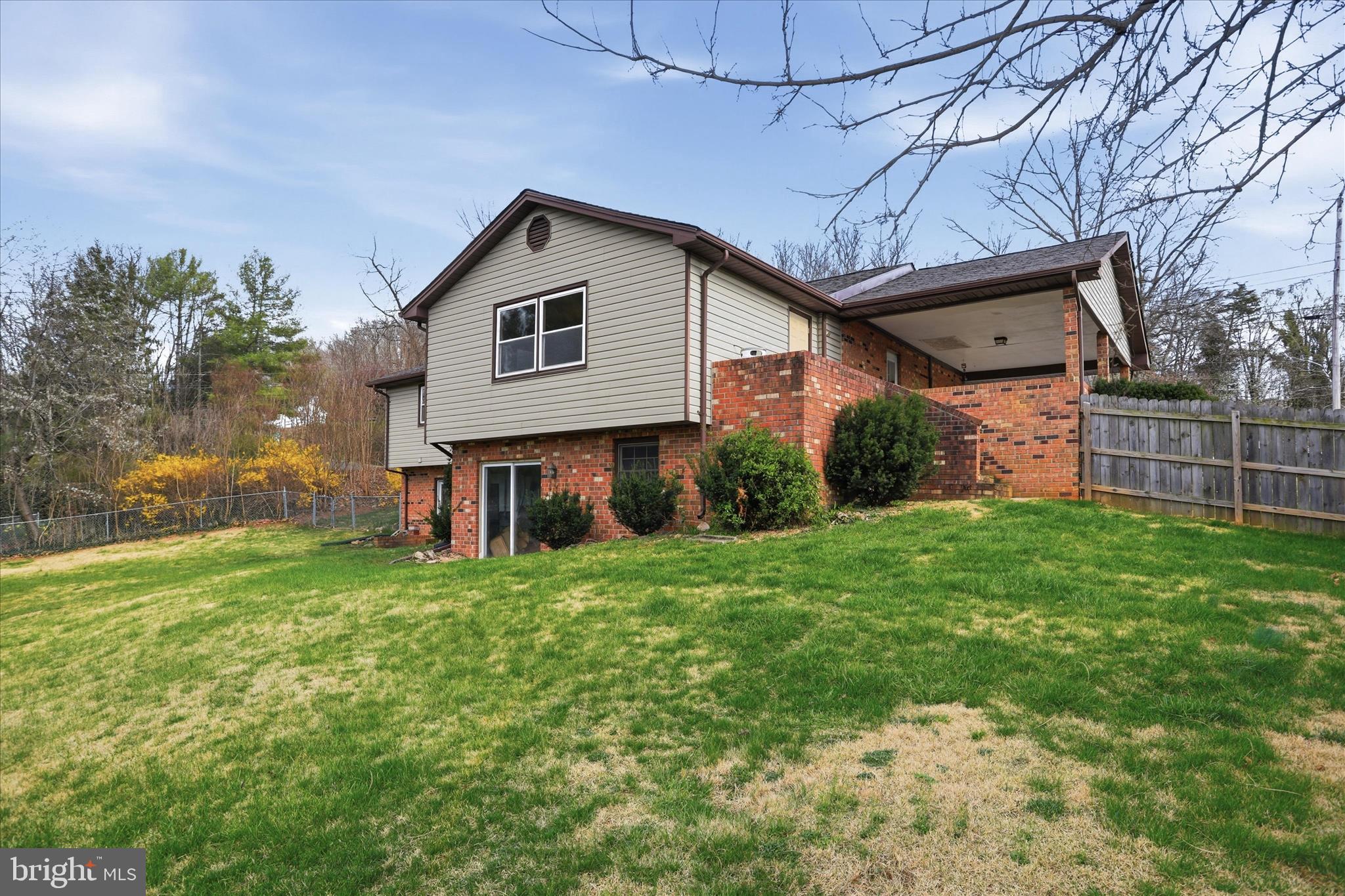 20 Gloucester Road Front Royal, VA 22630 - Photo 38 of 43 a view of a house with a yard and sitting area