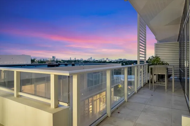 a view of a balcony with city view