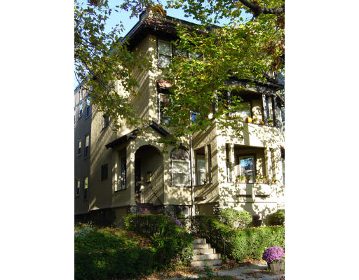 185 Rawson Road, Unit 3 Brookline, MA 02445 - Photo 1 of 18 a picture of a tree in front of a house
