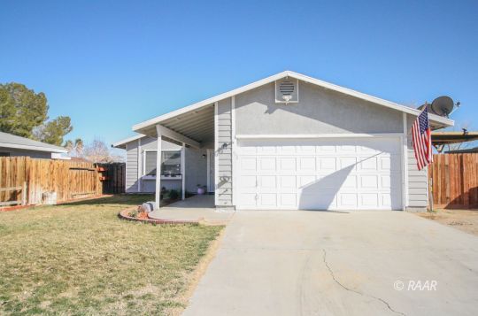 408 South Valley Street Ridgecrest, CA 93555 - Photo 29 of 29 a view of a house with backyard and trees