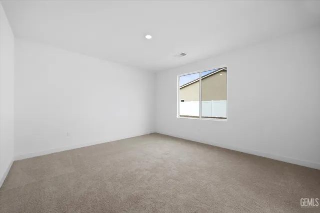 a spacious bathroom with a bathtub shower sink and mirror