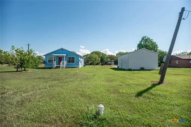 a view of workspace with wooden floor