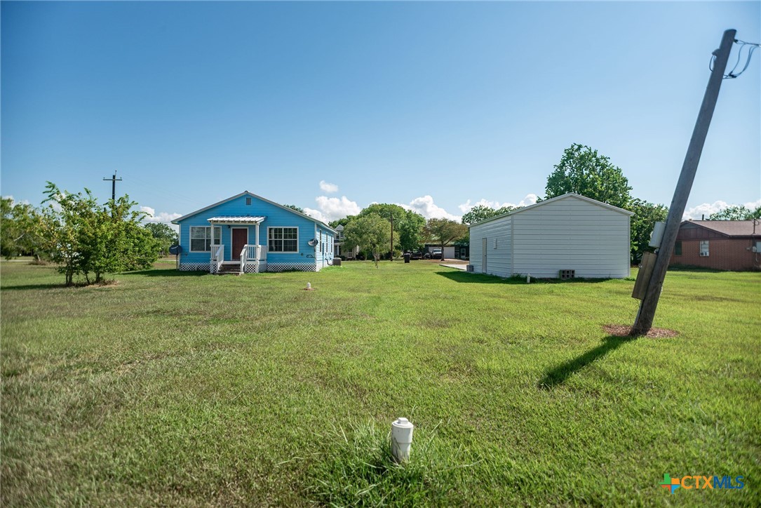 512 McDowell Street Austwell, TX 77950 - Photo 24 of 30 a house view with a garden space