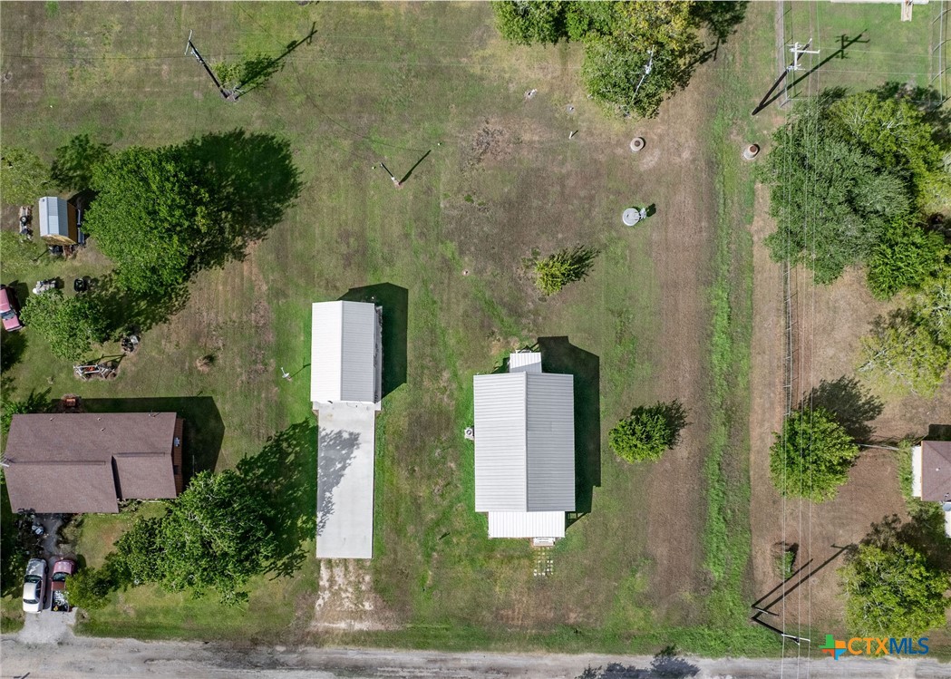 512 McDowell Street Austwell, TX 77950 - Photo 27 of 30 an aerial view of a house with a yard