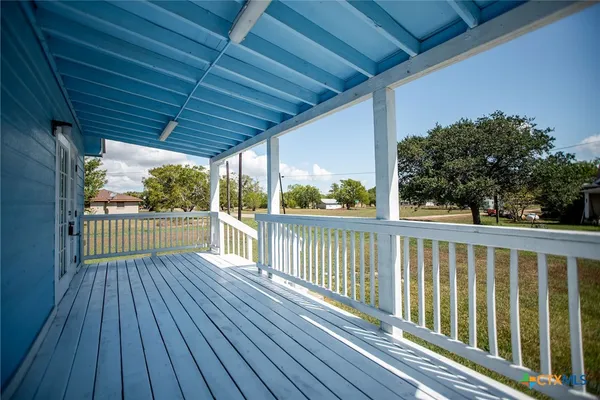 a view of outdoor space with wooden deck