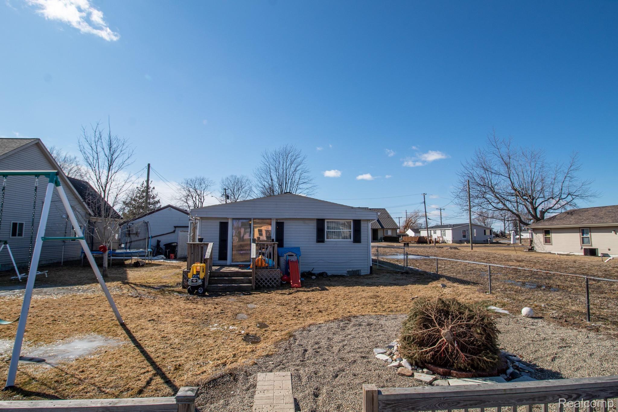 7353 Bealane Road Algonac, MI 48001 - Photo 19 of 24 Back of house.jpg