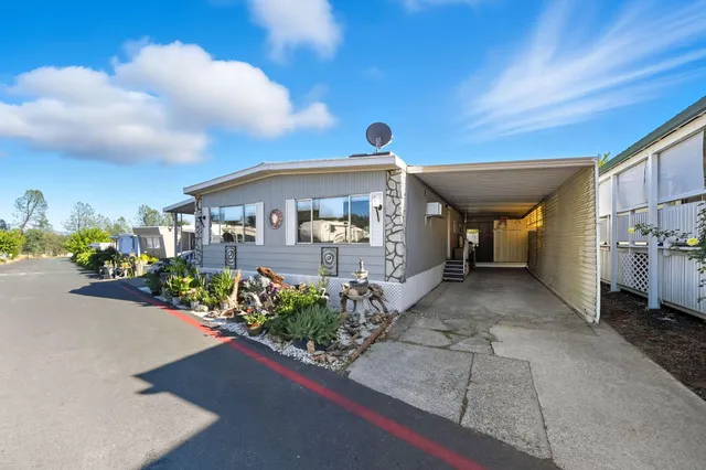 a front view of a house with an outdoor space