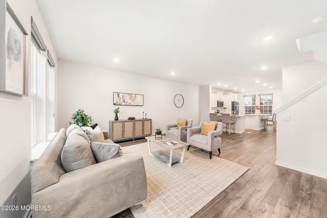 a living room with furniture and a table