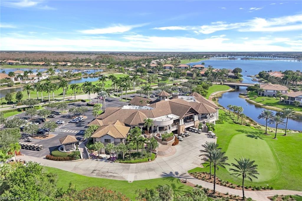8771 Coastline Court, Unit 201 Naples, FL 34120 - Photo 36 of 49 an aerial view of residential houses with outdoor space