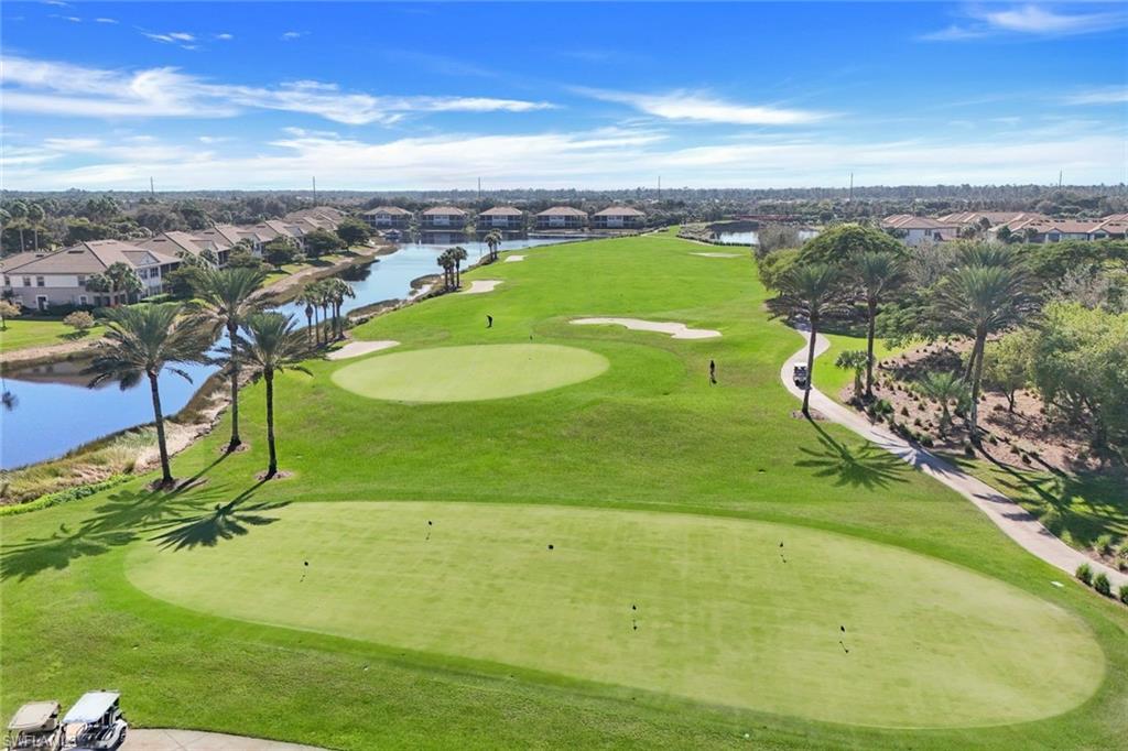 8771 Coastline Court, Unit 201 Naples, FL 34120 - Photo 38 of 49 an aerial view of a pool